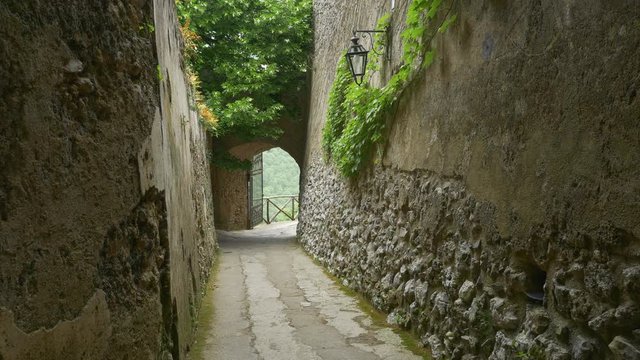 Small laneway in Ravello, Amalfi Coast, Italy. Light breeze in the foliage.