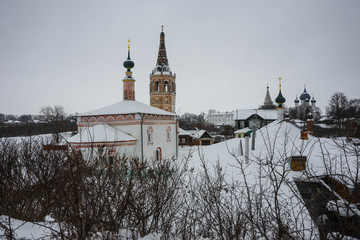 Winter landscape with church in Suzdal in Vladimir region, Russia