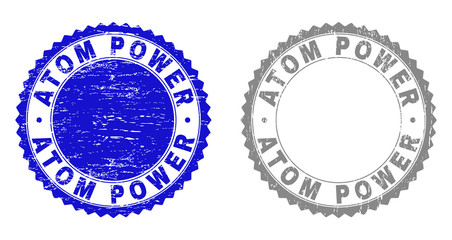 Grunge ATOM POWER watermarks isolated on a white background. Rosette seals with grunge texture in blue and grey colors. Vector rubber imprint of ATOM POWER title inside round rosette.