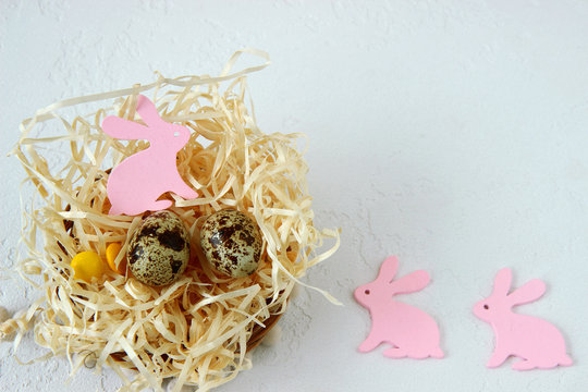 Happy Easter. Basket with eggs and rabbit	