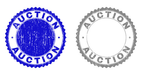 Grunge AUCTION stamp seals isolated on a white background. Rosette seals with grunge texture in blue and gray colors. Vector rubber overlay of AUCTION label inside round rosette.