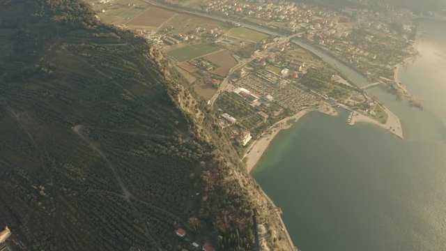 Aerial view of town of Torbole and the Lake Garda coast. Sudtirol, Italy