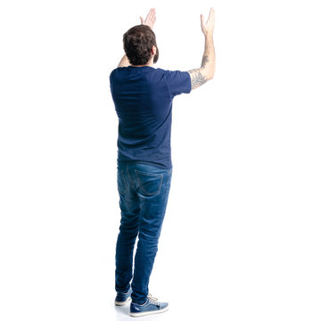 A Man In Jeans Showing On A White Background. Isolation, Back View