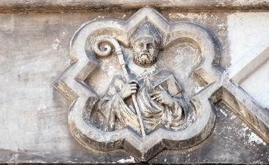 Saint on the portal of the Cathedral of S.Martino in Lucca, Italy