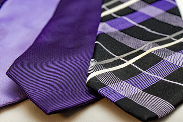 Collection of purple coloured business neckties