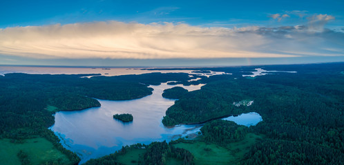 Naklejka na ściany i meble Republic of Karelia. Russia. Karelian Islands among the lakes. Areas covered with thick greens. Nature of Karelia. Travel to Russia. Camping.