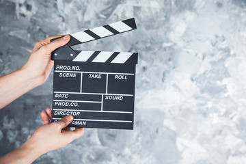 woman hand  movie clapper