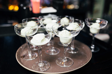 glasses with ice cream on a tray
