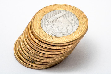 One real coins. Brazilian money. Selective focus. Brazilian currency. Economy, inflation, business. Front side. 1.