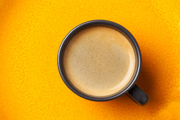 Cup of coffee on bright background