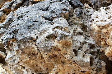 Geological layers of earth - Layered rock background. rock layer sediment. Layer of yellow sand. Crust of the Earth. Strata, slate or shale rock layers.