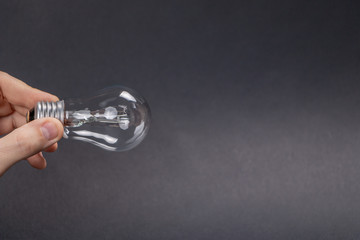 Light in a man's hand. Copy space location.