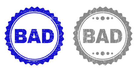 Grunge BAD stamp seals isolated on a white background. Rosette seals with grunge texture in blue and grey colors. Vector rubber overlay of BAD caption inside round rosette.