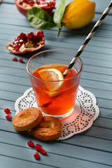 fresh pomegranate drink with lemon slice
