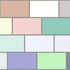 Colorful business cards are laid out in the form of a brick wall.