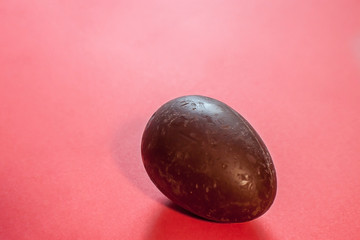 Egg on red background