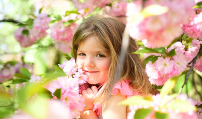 Fototapeta premium Small child. Natural beauty. Childrens day. Springtime. weather forecast. Little girl in sunny spring. Summer girl fashion. Happy childhood. face and skincare. allergy to flowers. Happy spring day