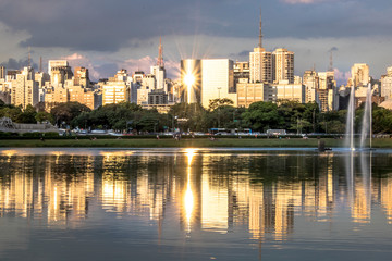 Fototapeta na wymiar Skyline of Sao Paulo city and reflex in lake