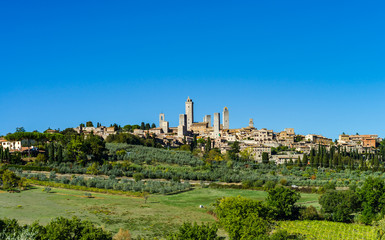 Fototapeta na wymiar Medieval old italian city on the top of the hill, Tuscany