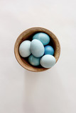 Colored easter eggs in a bowl