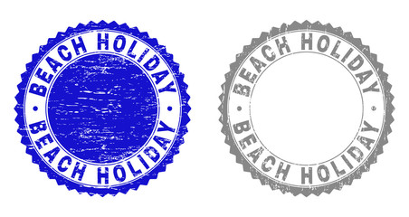 Obraz premium Grunge BEACH HOLIDAY stamp seals isolated on a white background. Rosette seals with grunge texture in blue and grey colors. Vector rubber imitation of BEACH HOLIDAY caption inside round rosette.