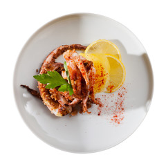 Plate of appetizing roasted shrimps