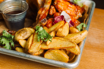 Snack to beer. Beer tray with a mountain of food.