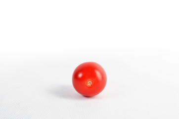 red tomato on white background