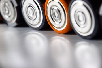 Salt and alkaline batteries, source of energy for portable technology. AAA and AA batteries