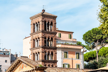 Rome, Italy cityscape of city town road Via Urbana near Piazza Esquilino park square on street in Rioni Monti neighborhood with basilica di santa pudenziana church tower