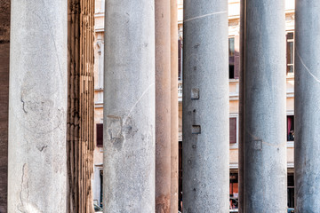 Closeup of old columns of European style building exterior architecture pattern of Pantheon in Rome, Italy and nobody