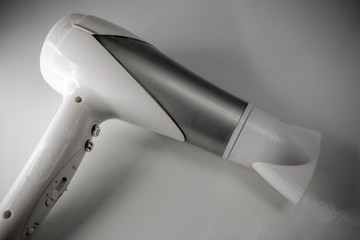 Large hair dryer on a light surface