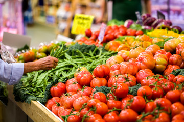 Fototapeta na wymiar Bright fresh vegetables on the counter of the market.