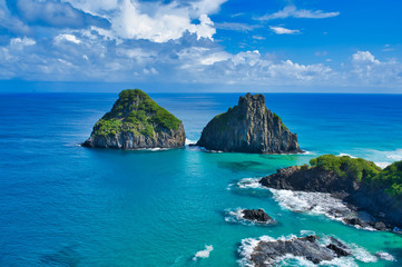 Fototapeta premium Two mountains with a beautiful sea and sky from above