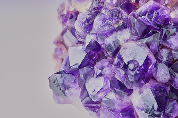 macro color photo of amethyst with focus stacking against white background