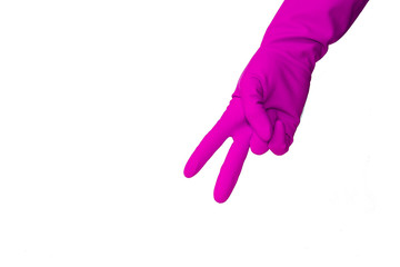 Hand in latex glove showing number two