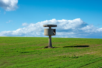 Old Abandoned Concrete Watchtower on a Green Hill, Apulia, Italy