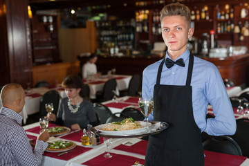 Waiter with serving tray