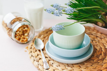 Set of ceramic pastel dishware on table