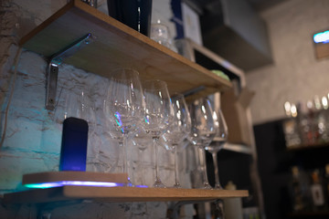 Glasses on the background of the bar