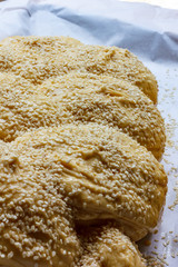 Sesame seeds stick to dough after applying an egg wash