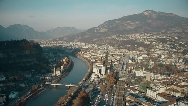 Aerial view of city of Trento, the Adige river and the Alps, Italy