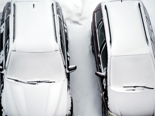 Ground parking cars after snowfall
