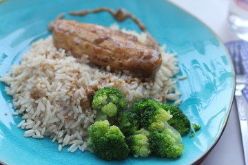 A turquoise plate with vegetarian lunch