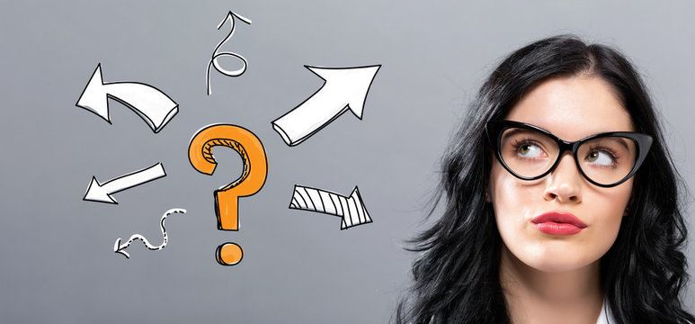 Question mark with arrows with young businesswoman in a thoughtful face