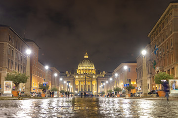 ROME / ITALY - DECEMBER 23, 2018: The magnificent evening view of St. Peter's Basilica in Rome by...