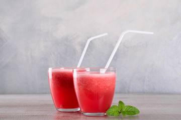 Watermelon smoothie on wood background , healthy drink. Summer. Watermelon pieces. 