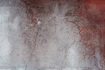 Background. Antique surface with cracks, potholes and stains of red paint. Daylight shooting