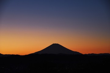 Mt.Fuji and its mountain range sunset silhouette