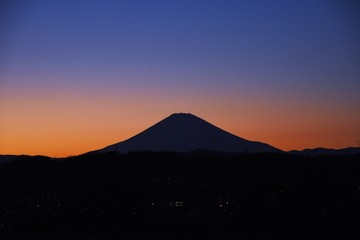 Mt.Fuji and its mountain range sunset silhouette